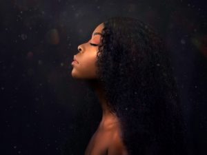 A black woman in solitude and peace